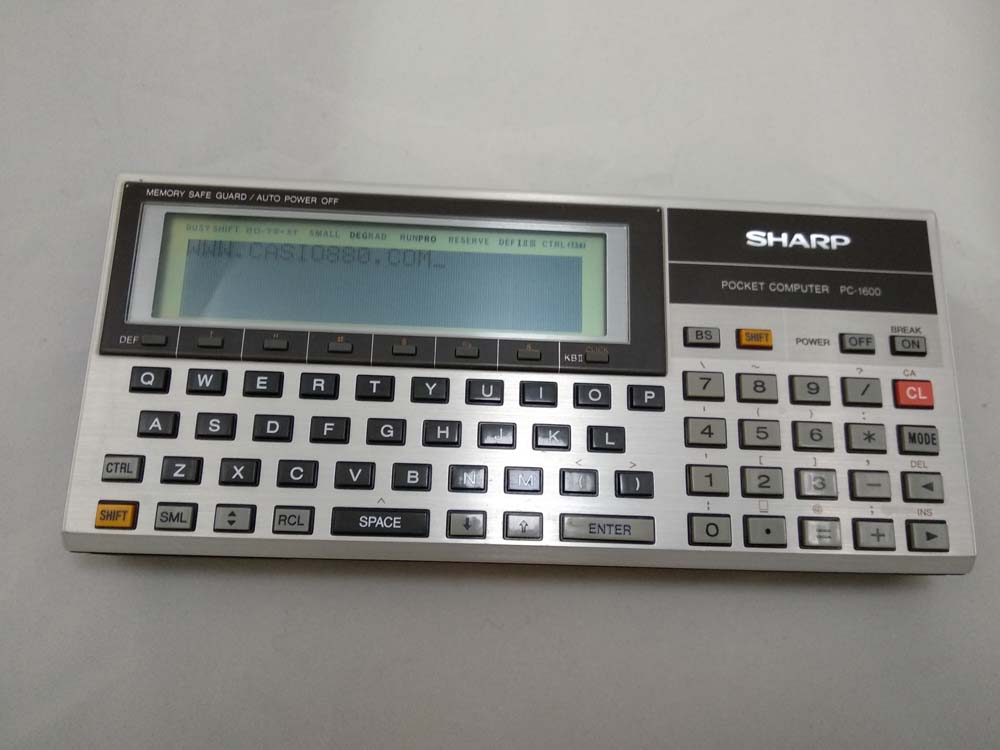 Sharp calculator PC1600 with CE1601M 593 Casio 880